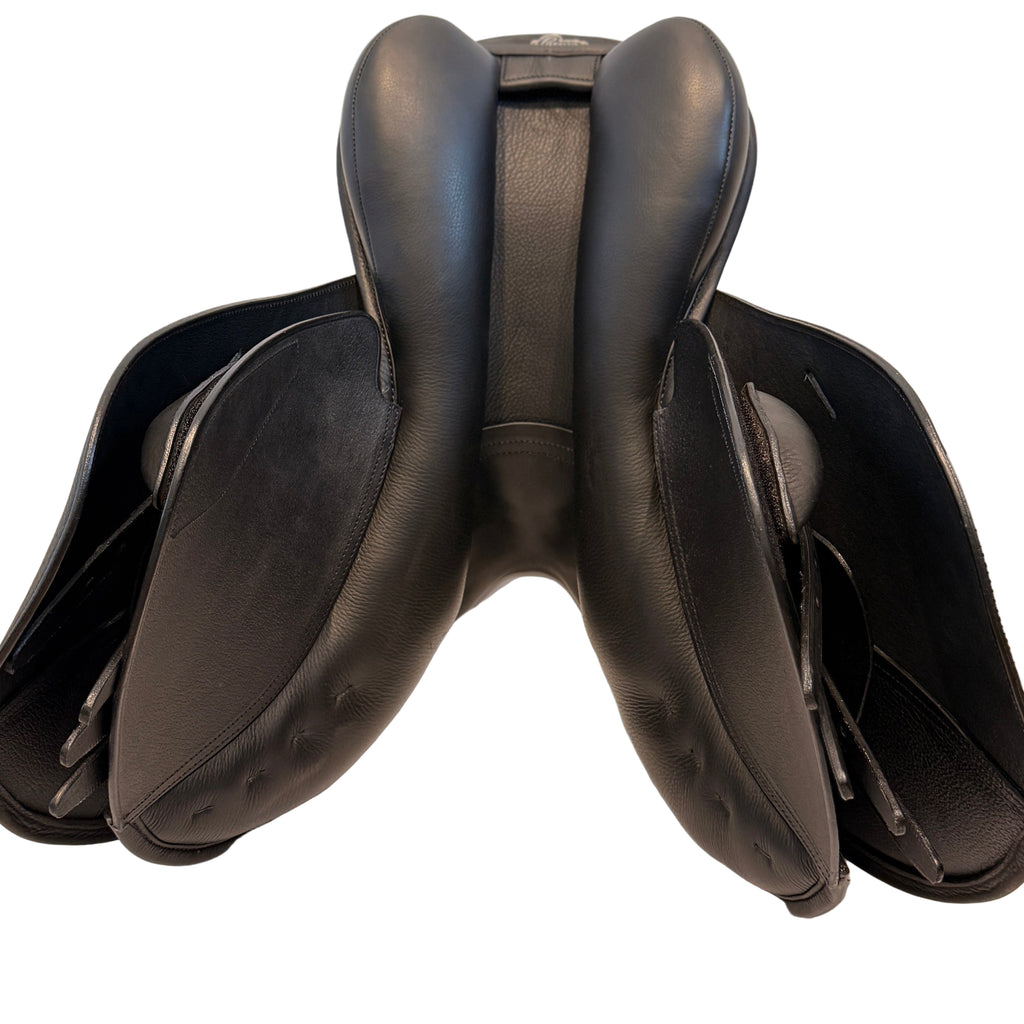 Brown leather saddle on a white background