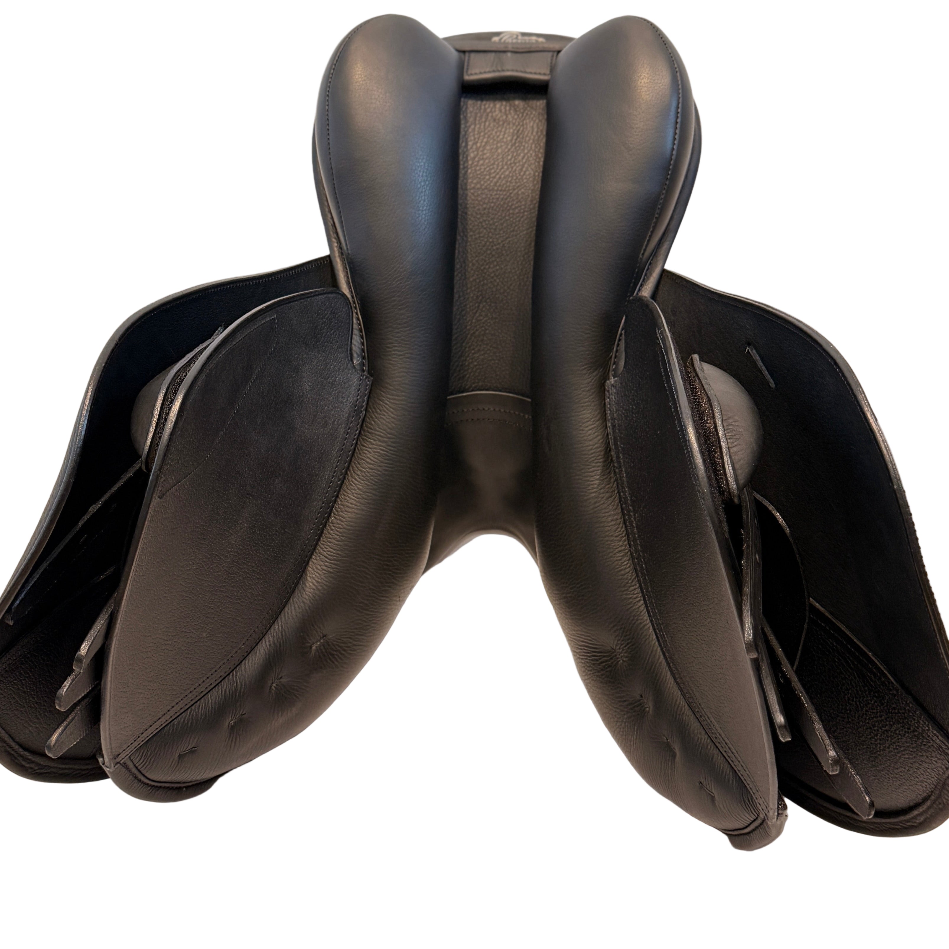 Brown leather saddle on a white background